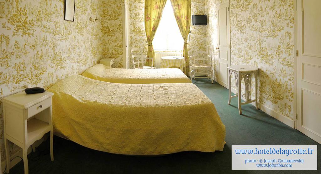 Hotel De La Grotte 蒙蒂尼亚克 客房 照片
