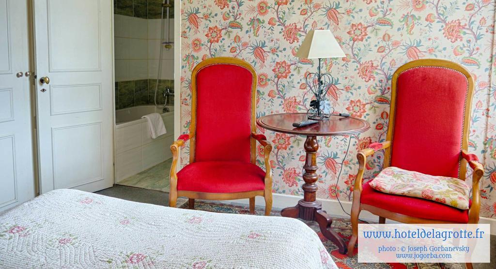 Hotel De La Grotte 蒙蒂尼亚克 外观 照片