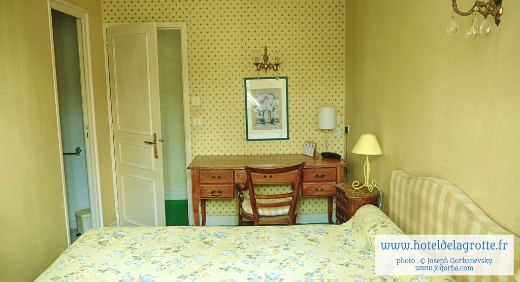 Hotel De La Grotte 蒙蒂尼亚克 外观 照片