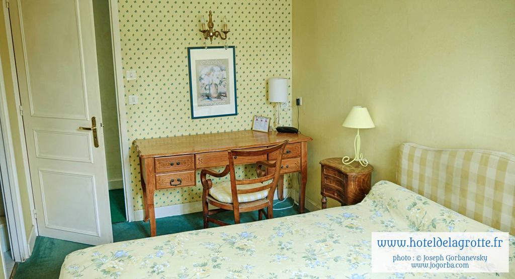 Hotel De La Grotte 蒙蒂尼亚克 外观 照片